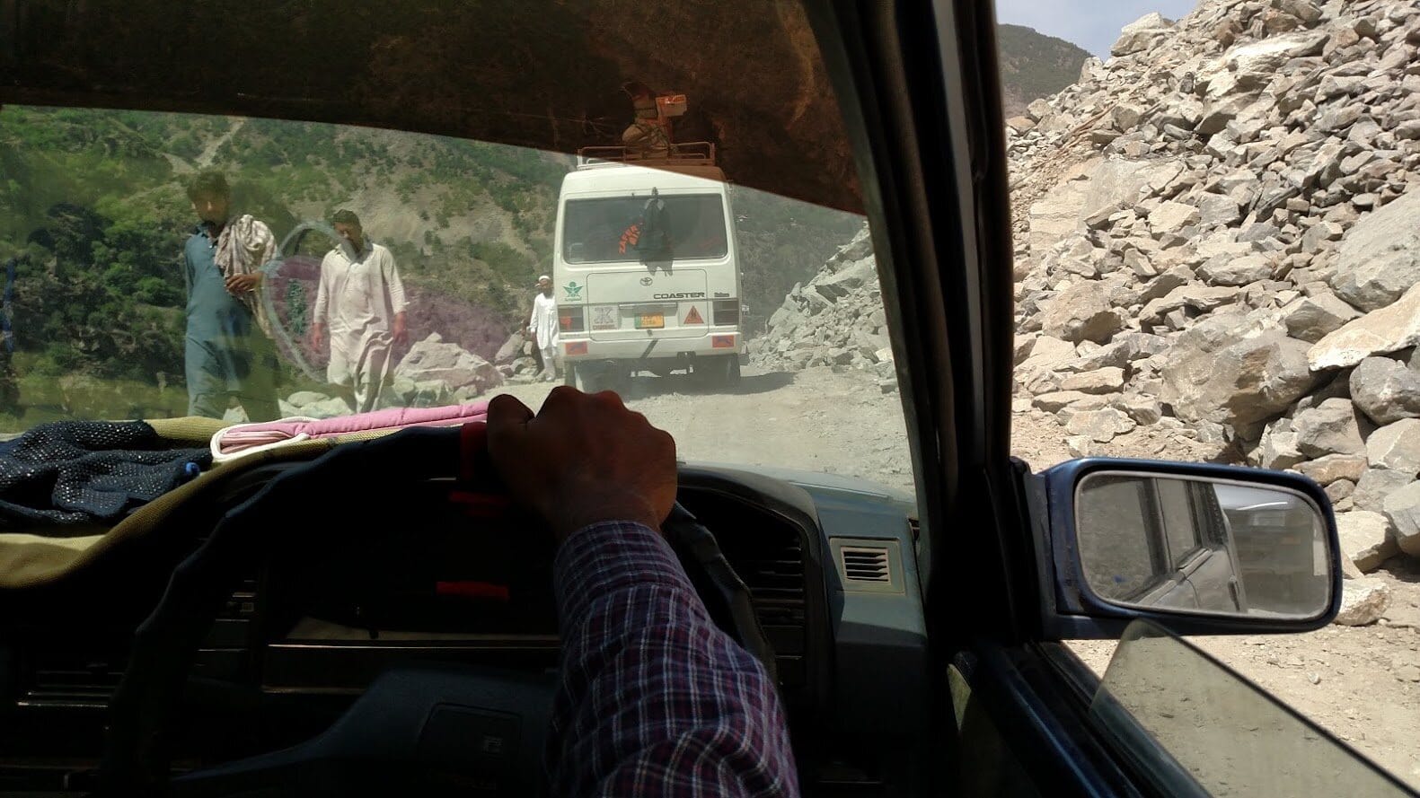 The landslide, five to ten km from Dasu.