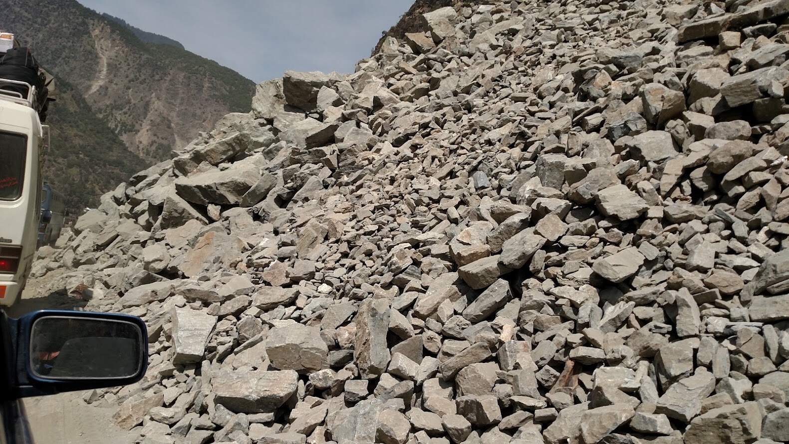 The landslide, five to ten km from Dasu.