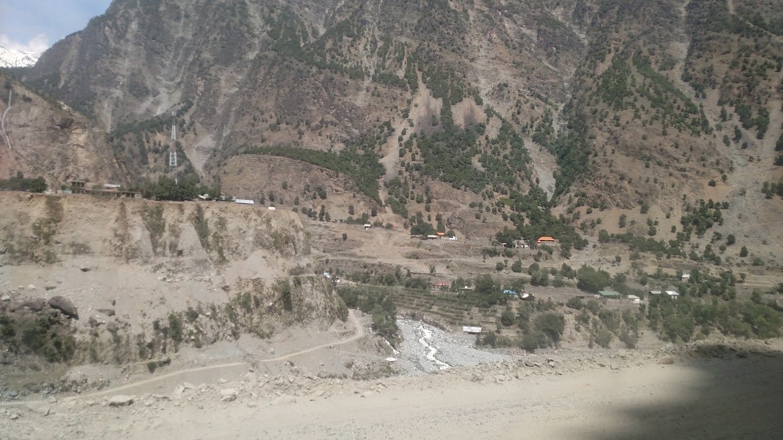 The landslide, five to ten km from Dasu.