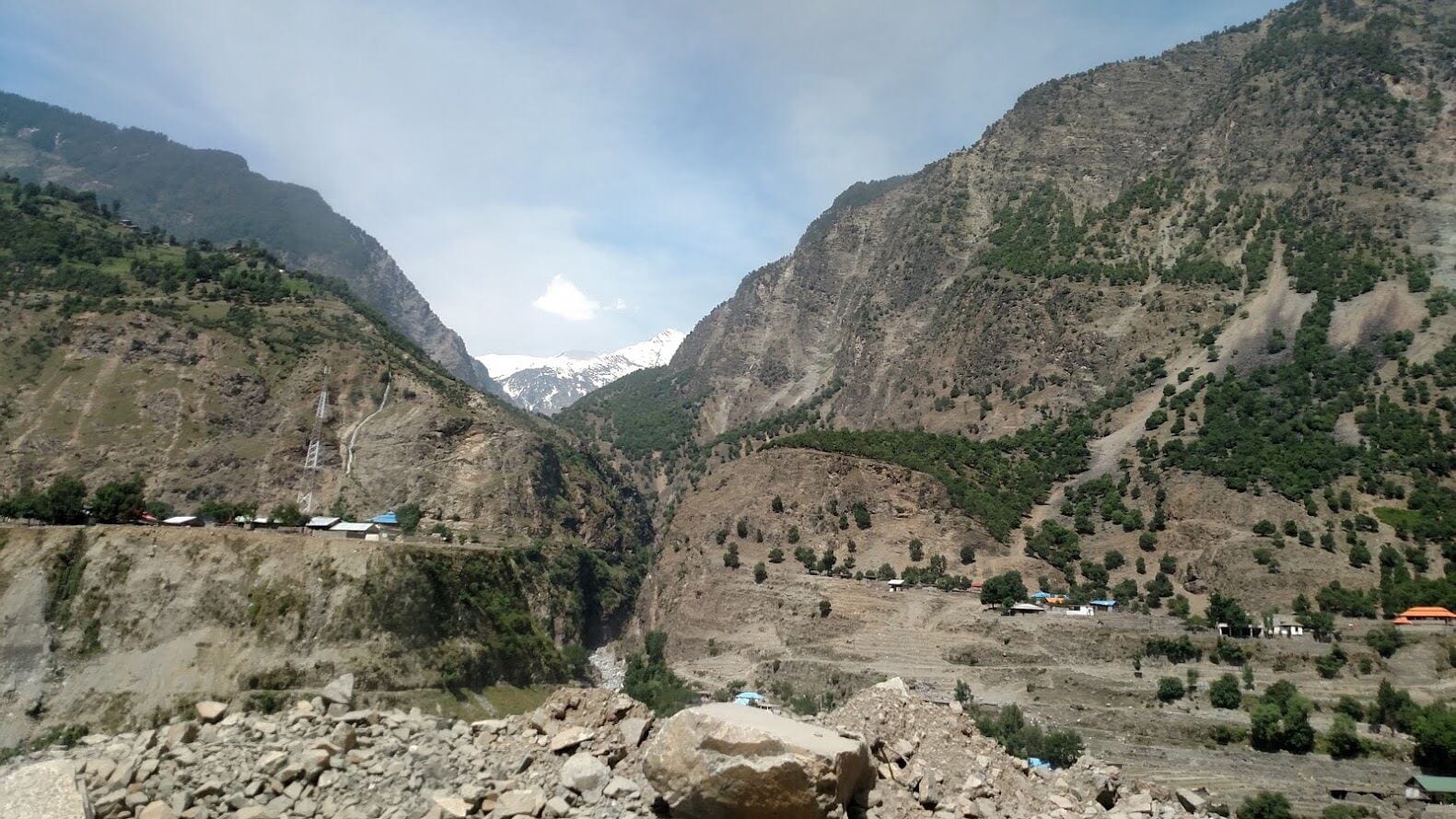 The landslide, five to ten km from Dasu.