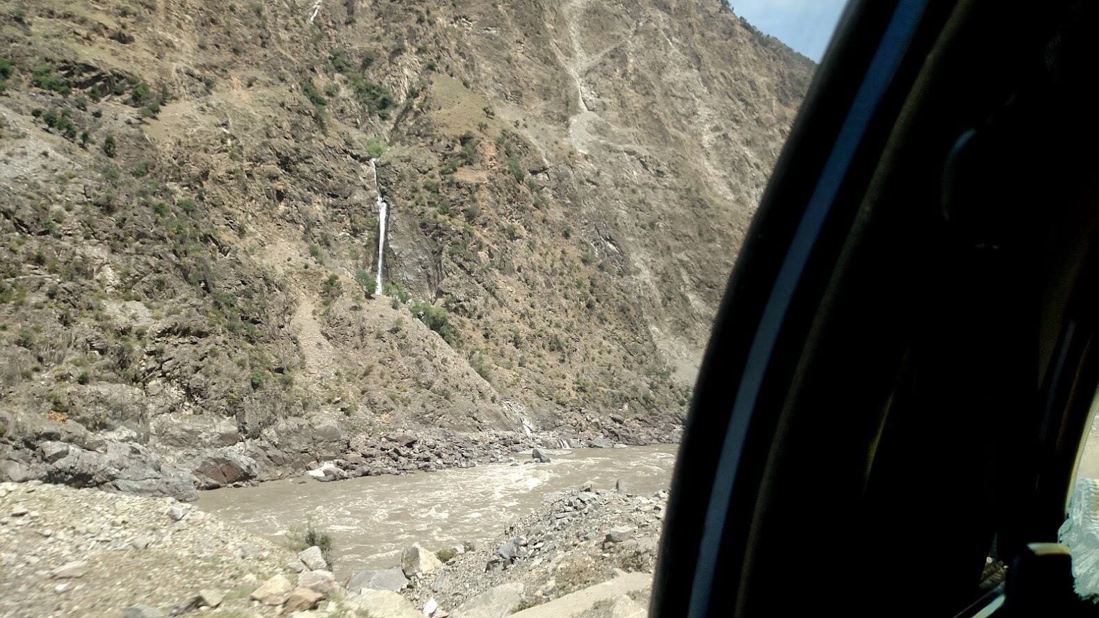 The landslide, five to ten km from Dasu.