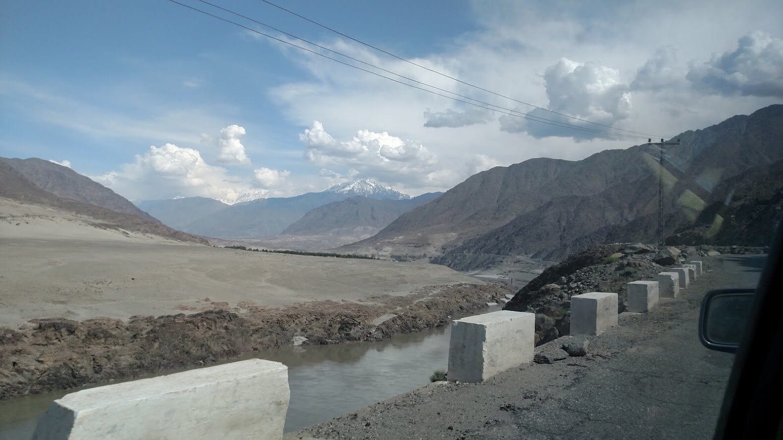 Schoolchildren getting a lift out of Dasu.