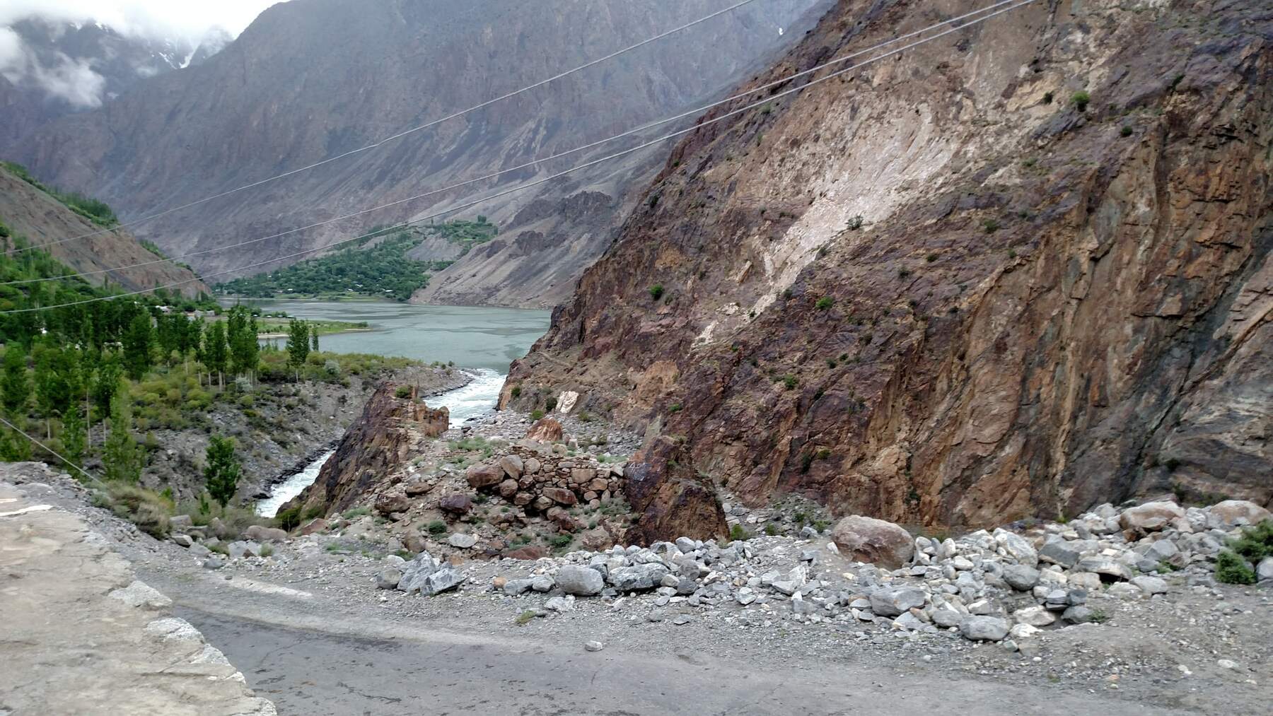 A grey river and a long road.