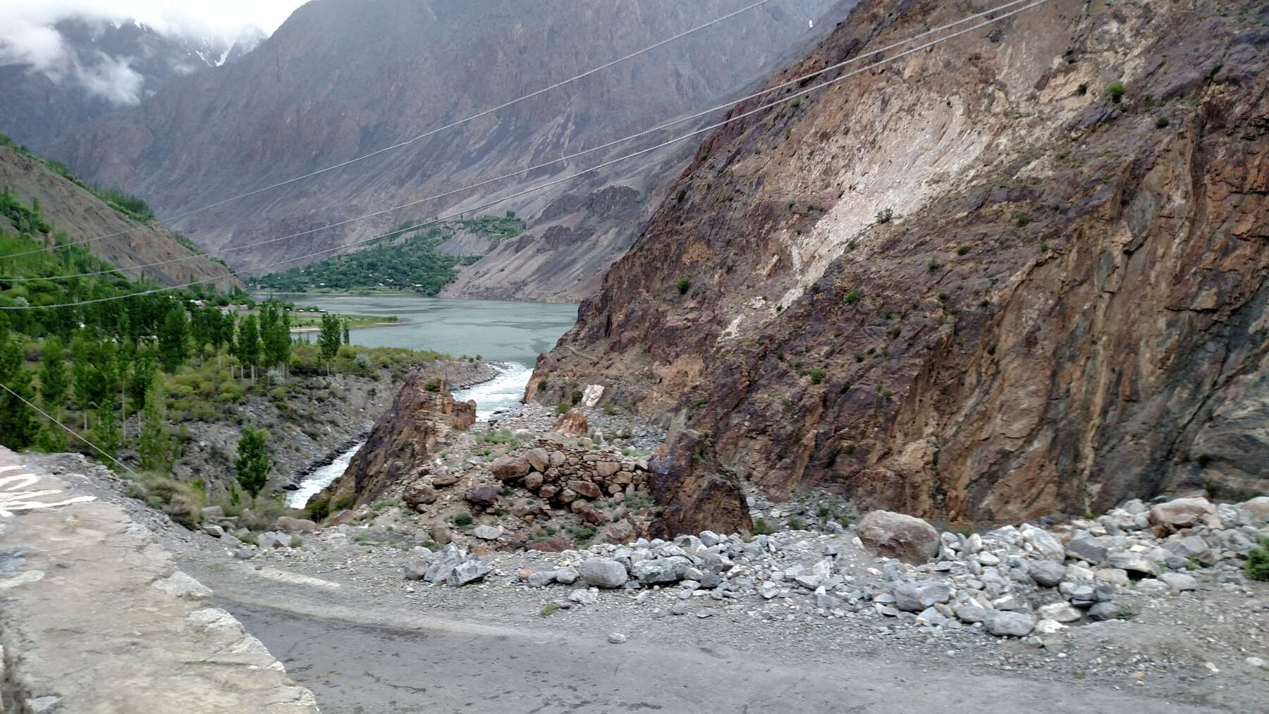 A grey river and a long road.