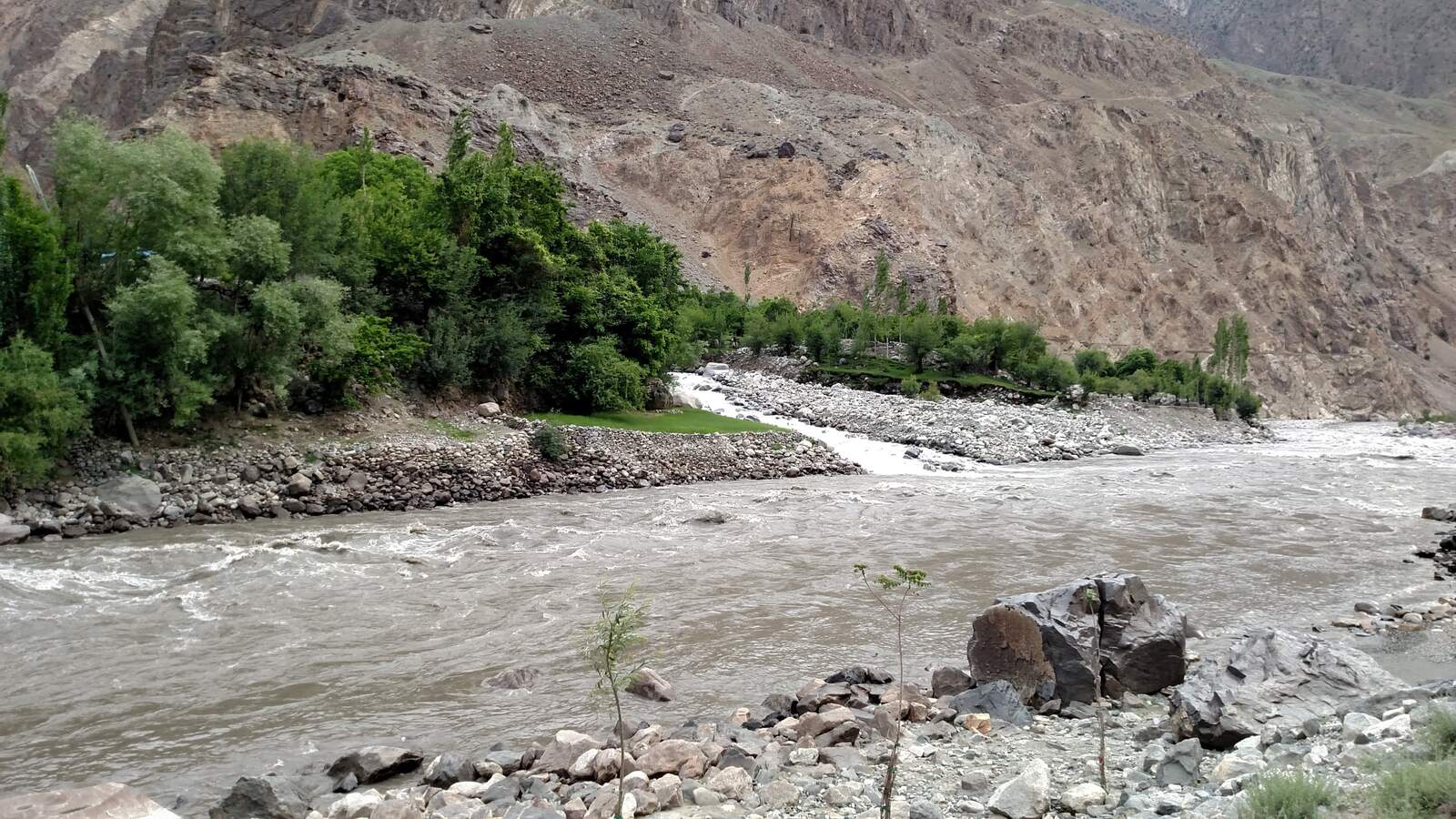 A grey river and a long road.