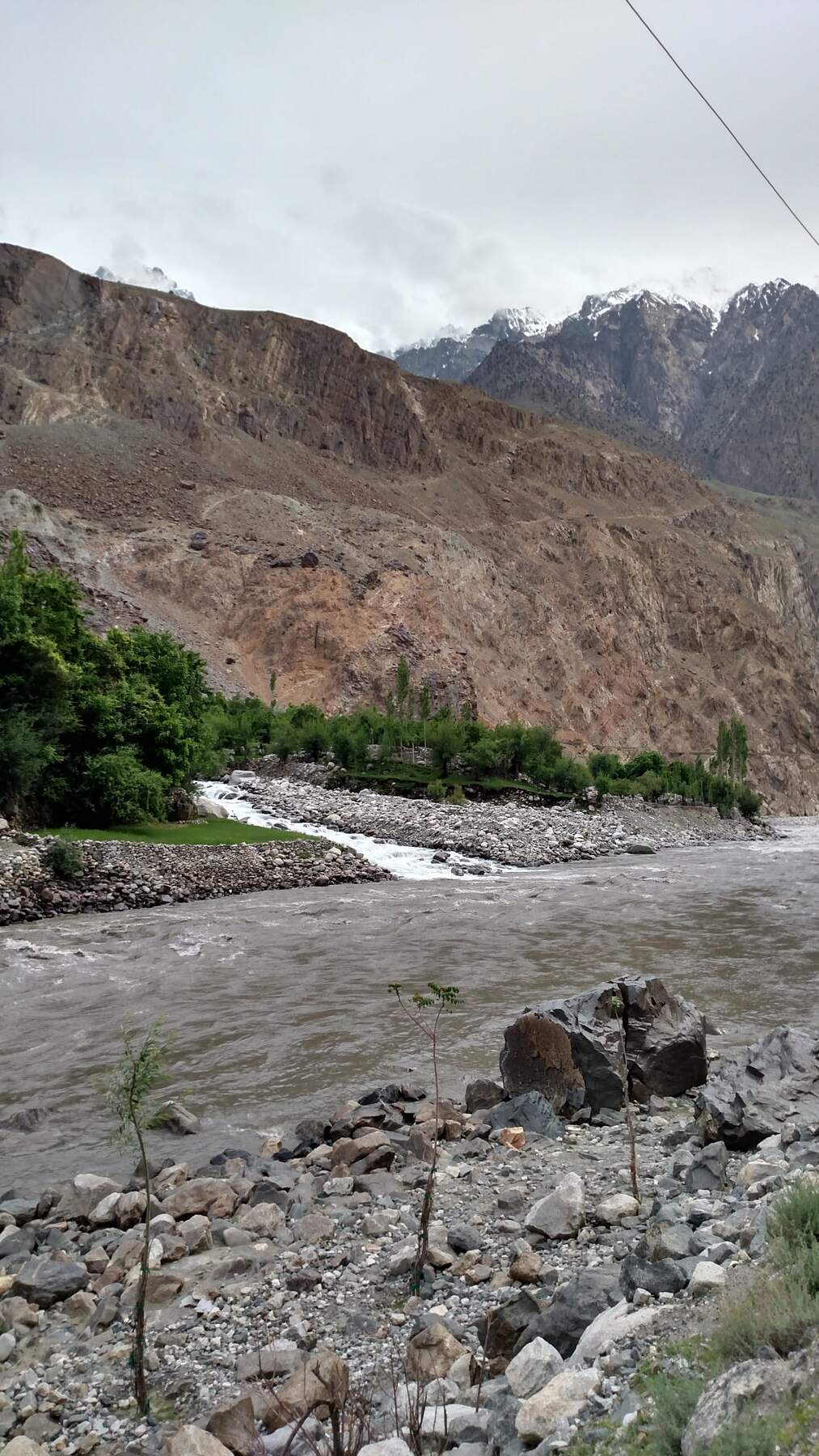 A grey river and a long road.